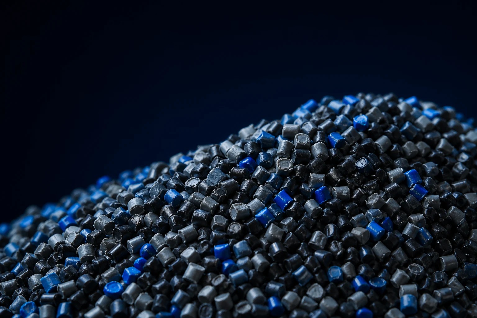 Clean black, grey and blue reprocessed polymer granules